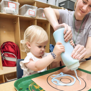 Preschooler having fun at preschool.